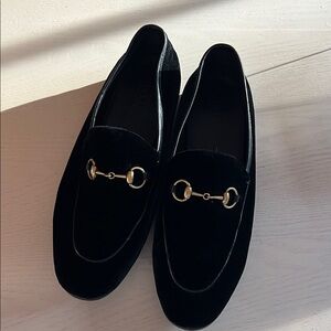Gucci Black Loafers with Gold Accents